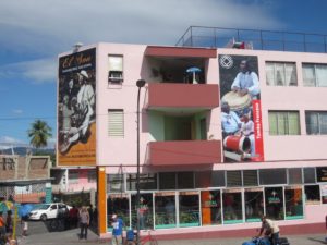 Newly painted building on Avenida Garzón. Photo by Rebecca Bodenheimer.